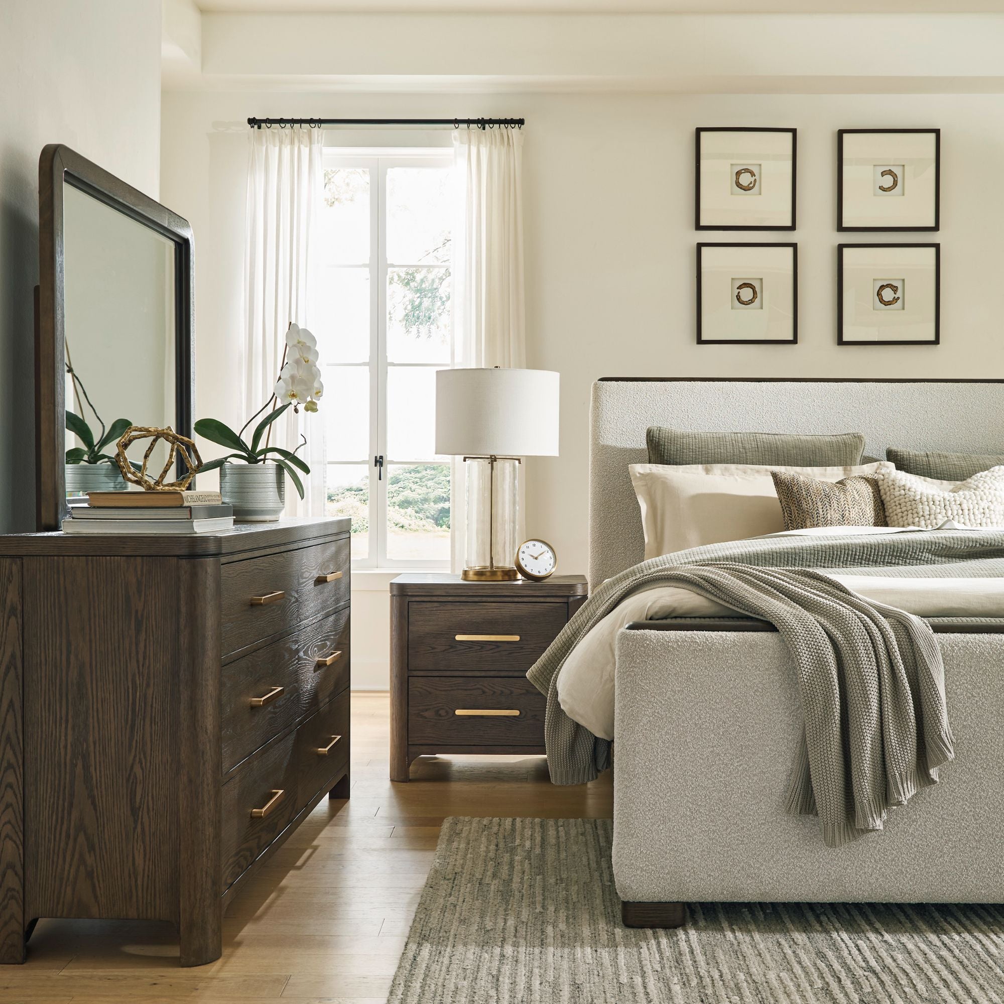 Signature Design by Ashley Radkin upholstered panel bedroom set with a bed frame and matching furniture in a modern style.