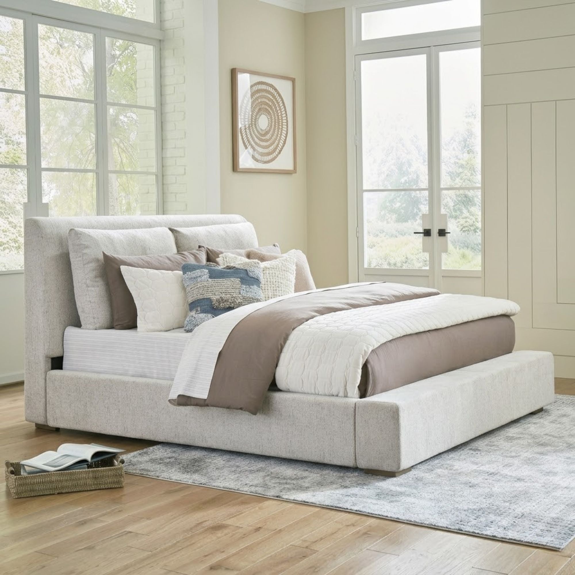 Signature Ashley Cabalynn upholstered bed with plush fabric and tufted headboard, showcasing a stylish bedroom furniture piece.