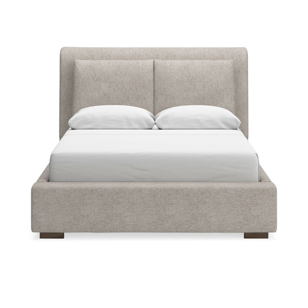 Upholstered bed with neutral fabric and tufted headboard from Signature Ashley Cabalynn Beds collection.