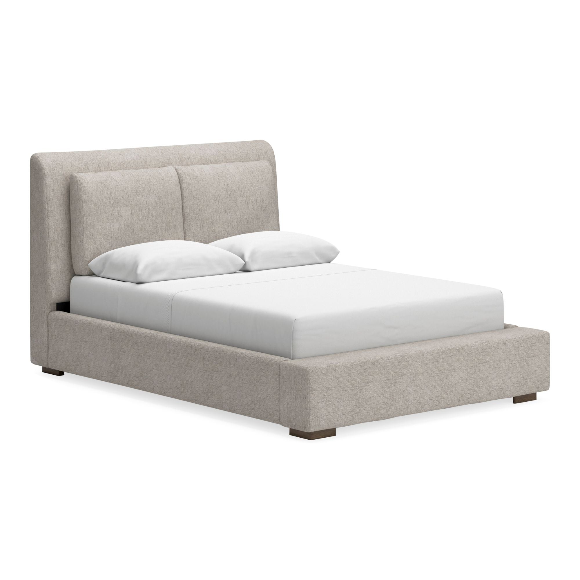 Signature Ashley Cabalynn upholstered bed with plush fabric headboard and modern design, shown in a stylish bedroom setting.