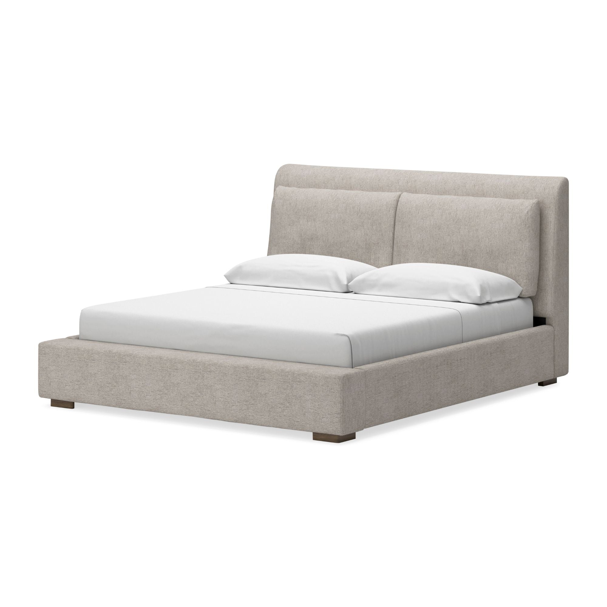 Signature Ashley Cabalynn upholstered bed with a padded headboard and neutral fabric, shown in a stylish bedroom setting.