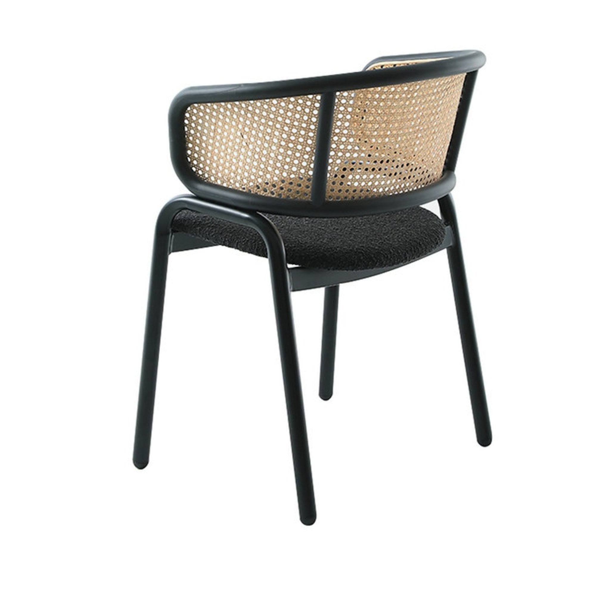 Black Bali Dining Arm Chair by Elite Living featuring a modern design with armrests and sleek wooden legs.
