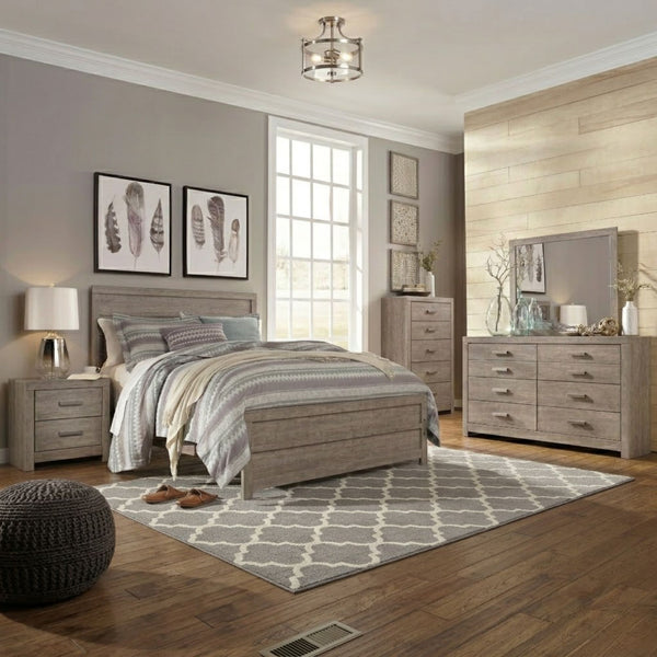 Gray Signature Ashley Culverbach bedroom set with a bed, matching nightstands, and dresser in a modern bedroom setting.