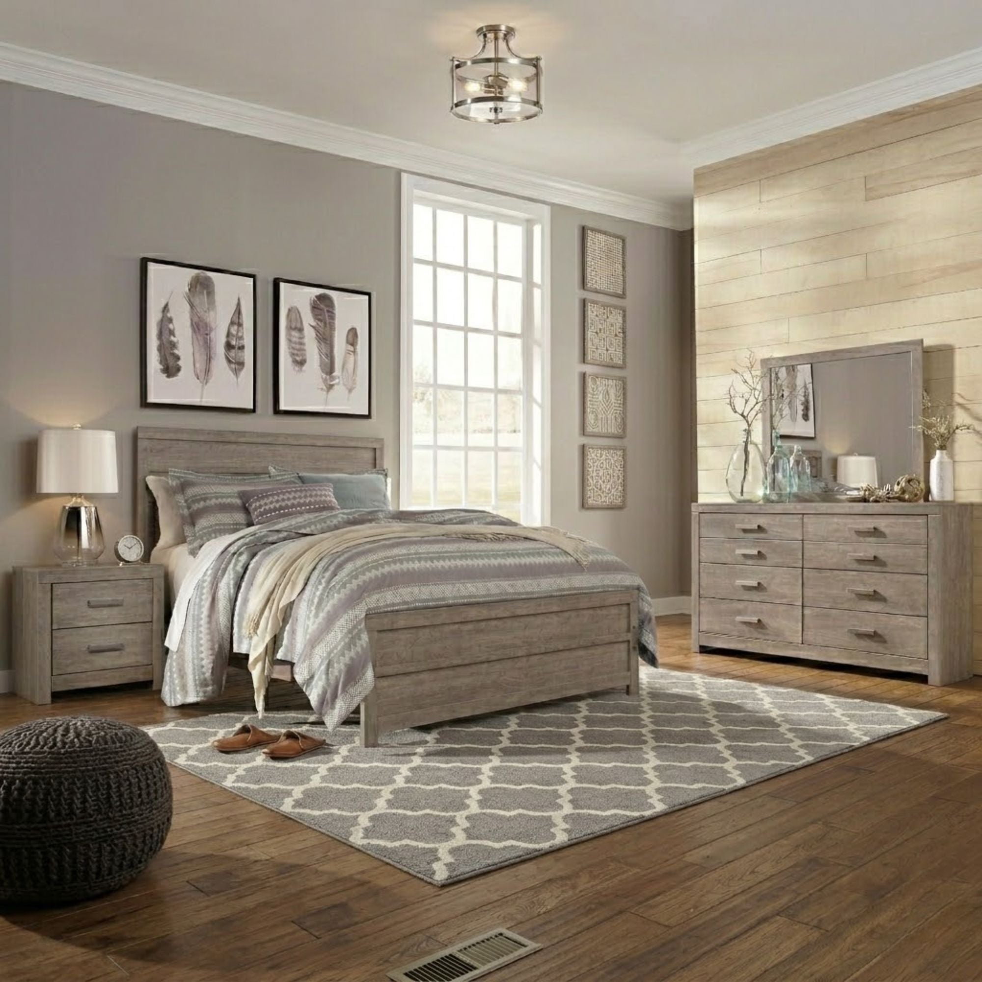 Gray Culverbach Bedroom Set by Signature Ashley featuring a bed, nightstands, and matching bedroom furniture in a modern design.