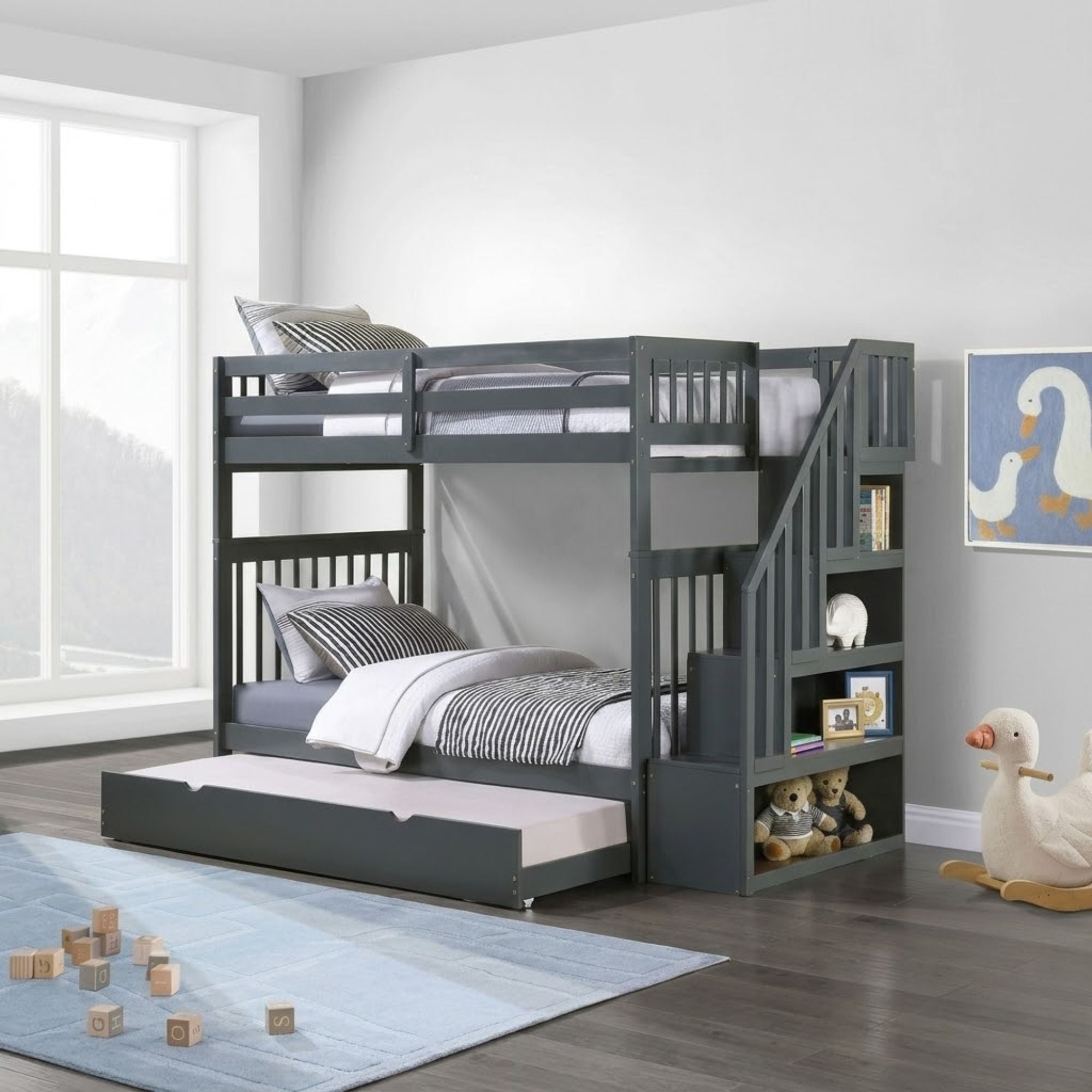 Grey Mission Espresso twin-over-twin bunk bed with staircase storage by IFF, showing the sturdy frame and built-in storage drawers.