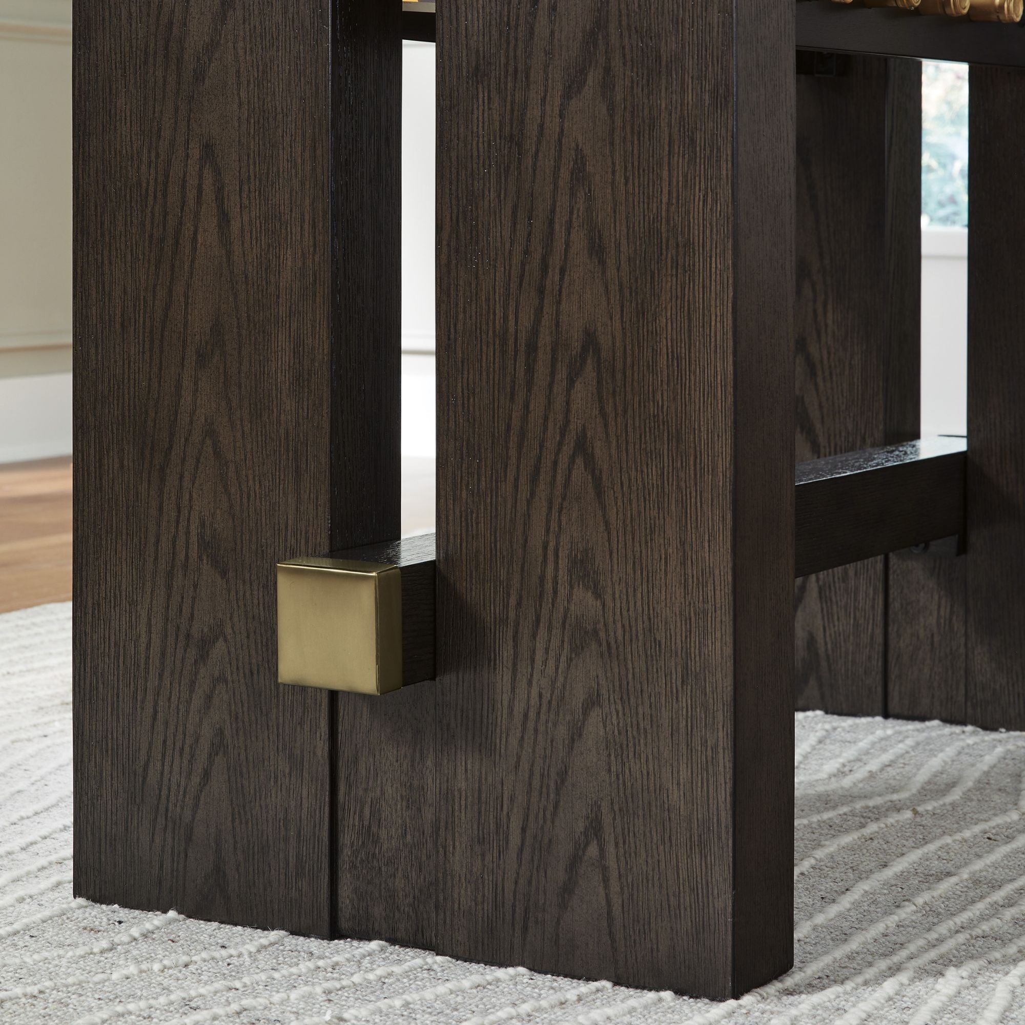 Dark brown Burkhaus RECT counter height dining table from Signature Ashley, shown with a modern design and sturdy wooden construction.