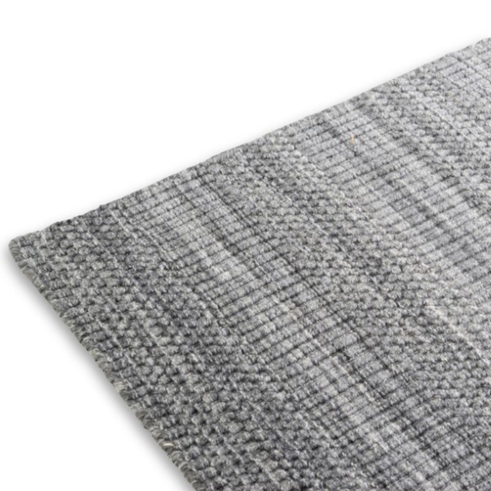 Viana Inc Celeste handloom area rug featuring intricate woven patterns in earthy tones, suitable for living rooms and bedrooms.