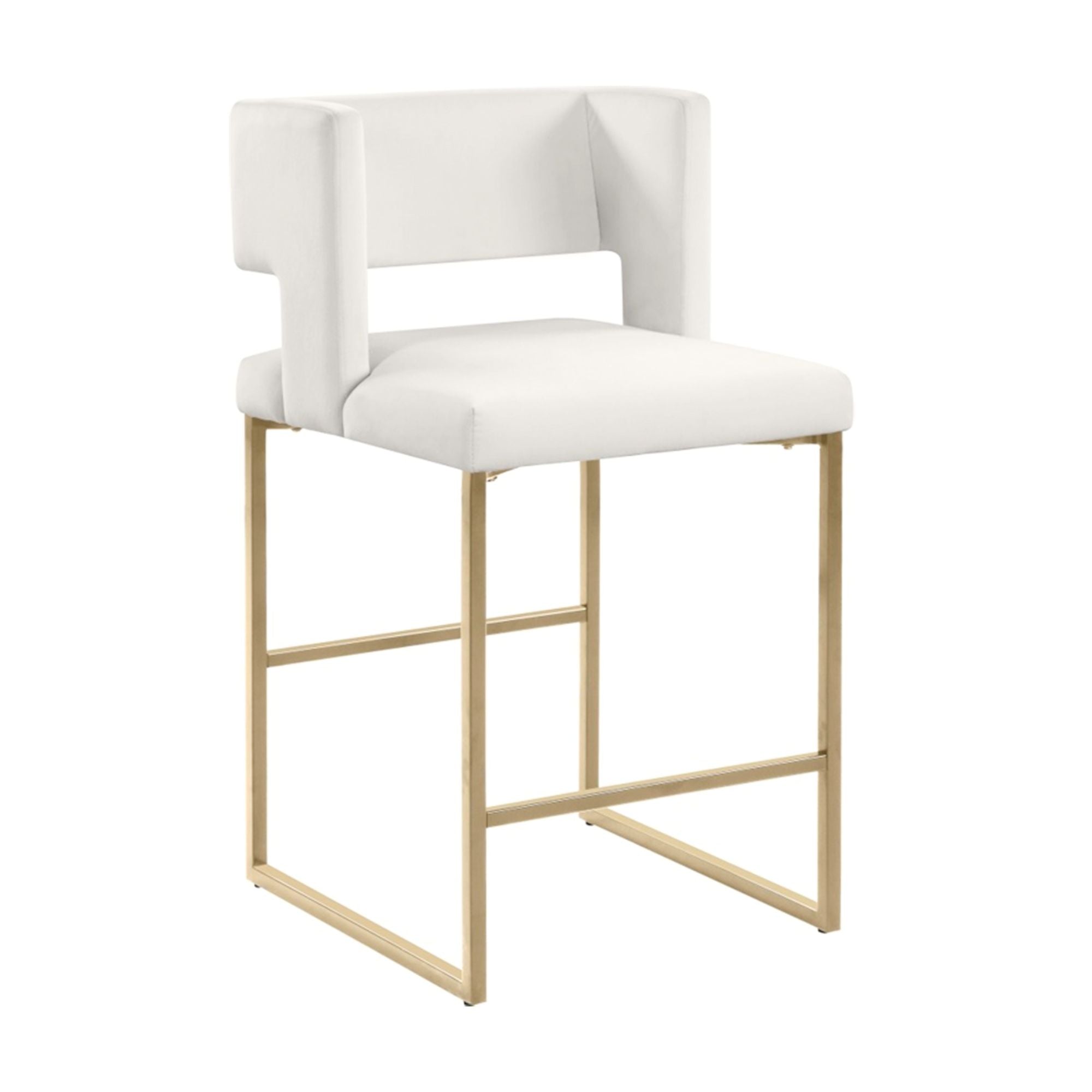 Pair of beige Brassex Anthony counter bar stools with metal legs, shown from the side in a modern kitchen setting.