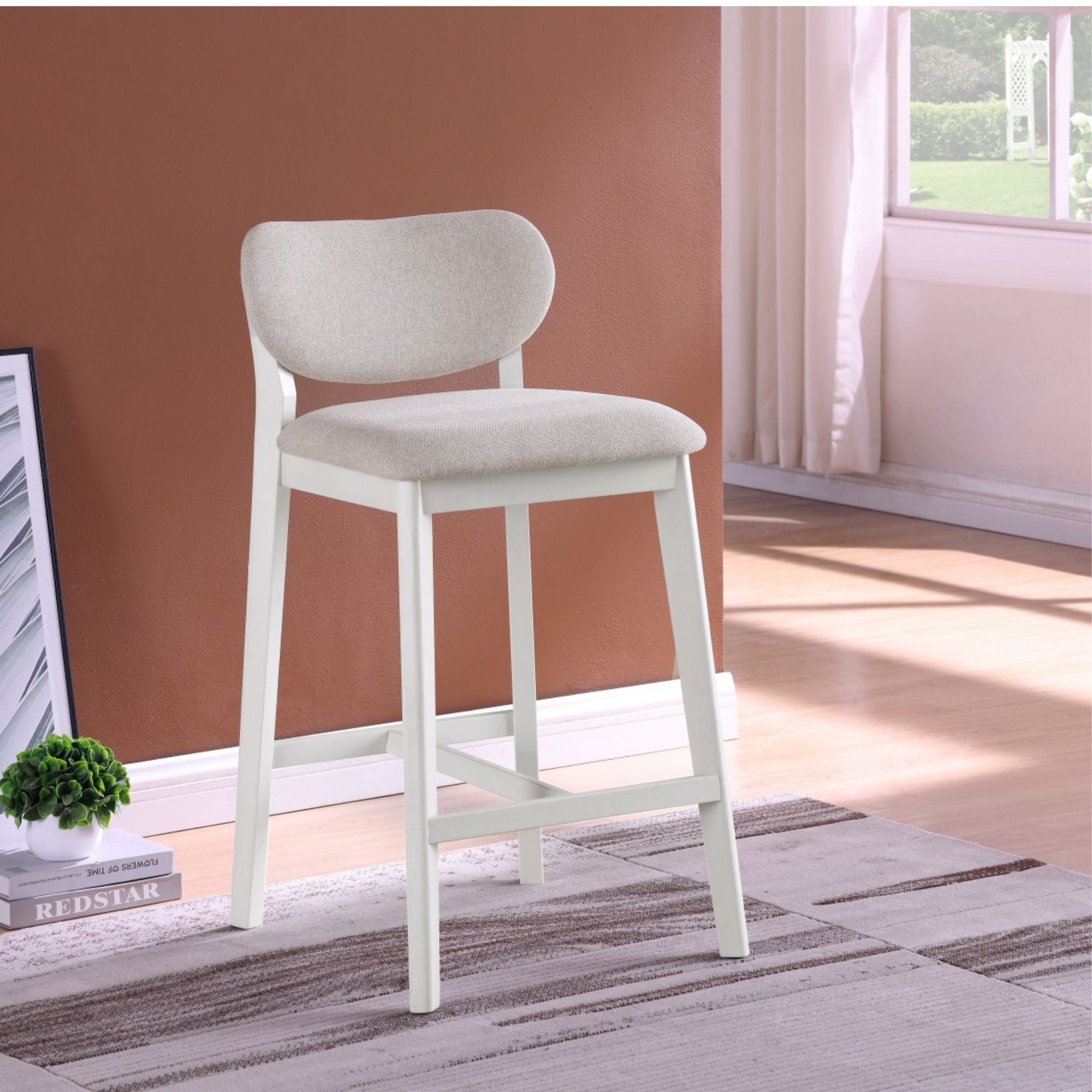 Set of two Brassex counter bar stools in cream with cushioned seats and sleek metal legs for modern kitchen or bar area.