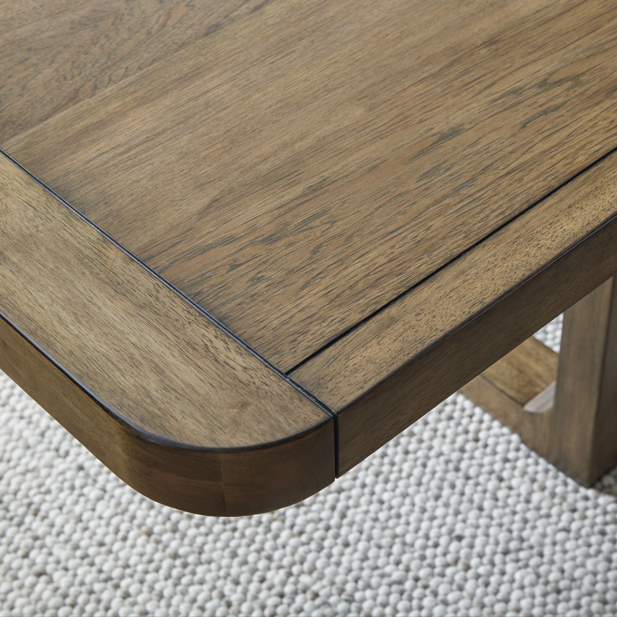 Cabalynn RECT dining room table by Signature Ashley with wooden top and sturdy legs, ideal for kitchen and dining spaces.