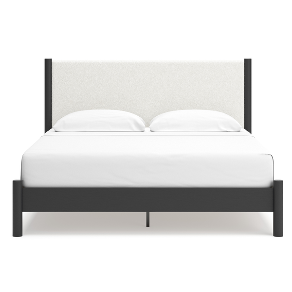 Black upholstered panel platform bed by Signature Ashley, featuring a modern design with a padded headboard and sleek frame.