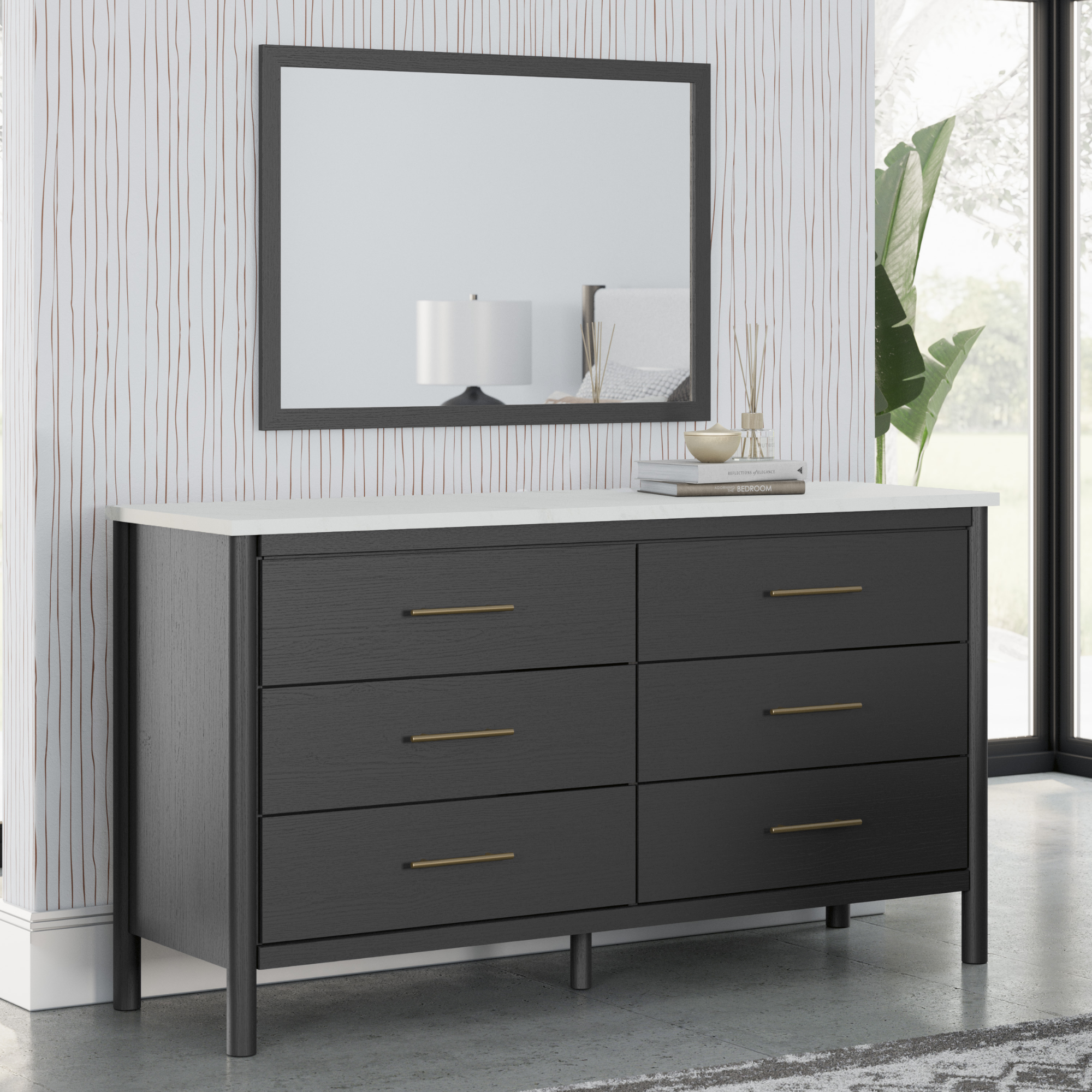 Black Cadmori dresser and mirror from Signature Ashley, showcasing a modern bedroom furniture set with sleek design and storage.
