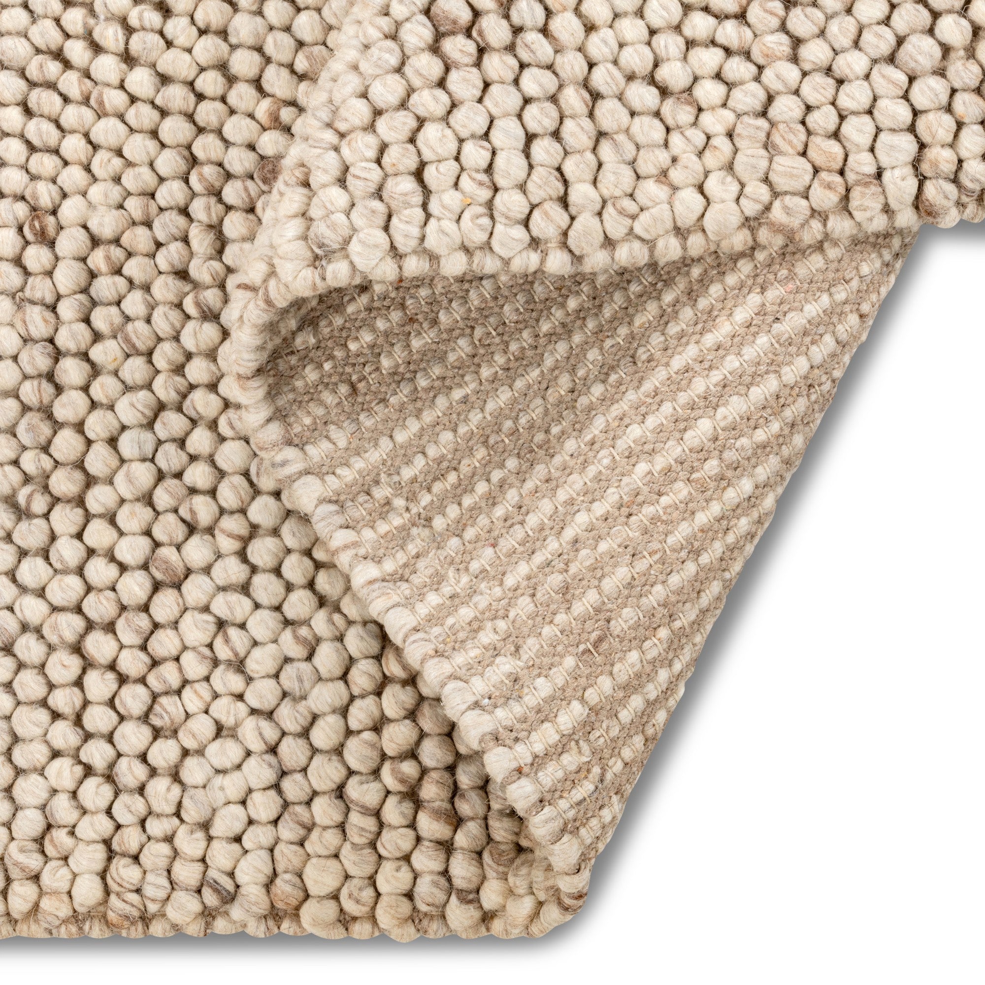 Viana Inc Calabria handmade wool rug featuring intricate patterns and warm earthy tones, ideal for adding texture to living spaces.