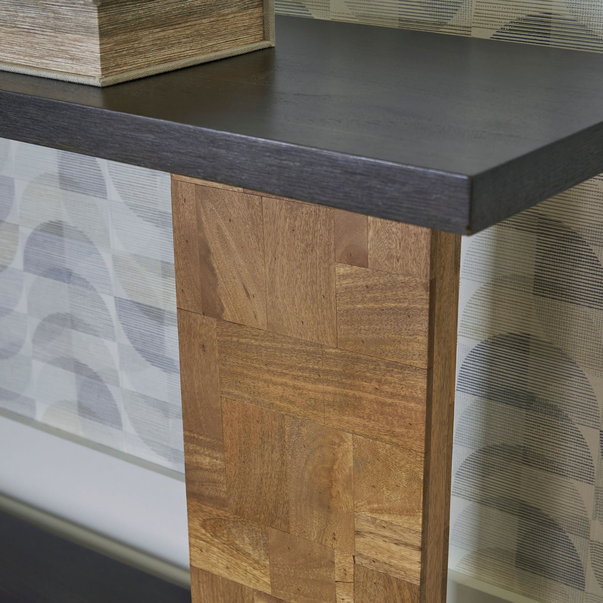 Signature Design by Ashley Camlett Console Sofa Table showing a modern wooden table with a sleek design and sturdy legs.