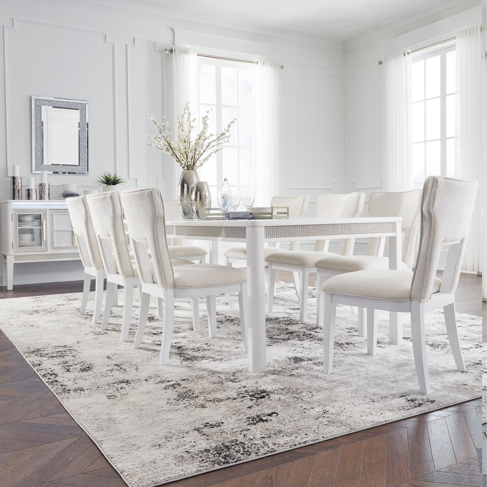 White Chalanna dining room set by Signature Ashley, featuring a table with matching chairs in a modern, elegant design.