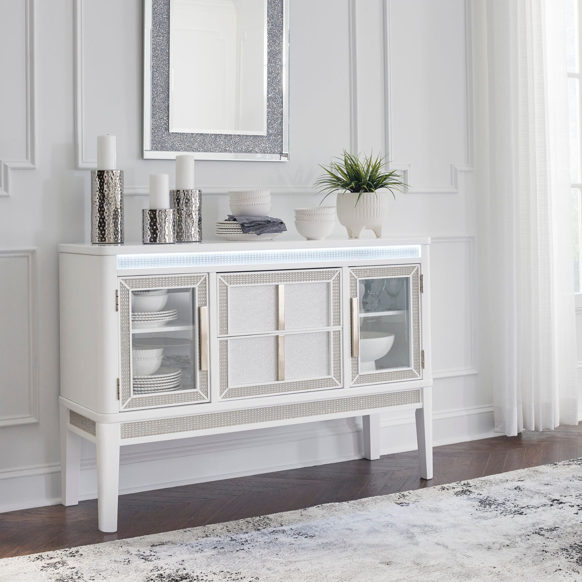 White Chalanna dining room server by Signature Ashley featuring storage drawers and a sleek, modern design.