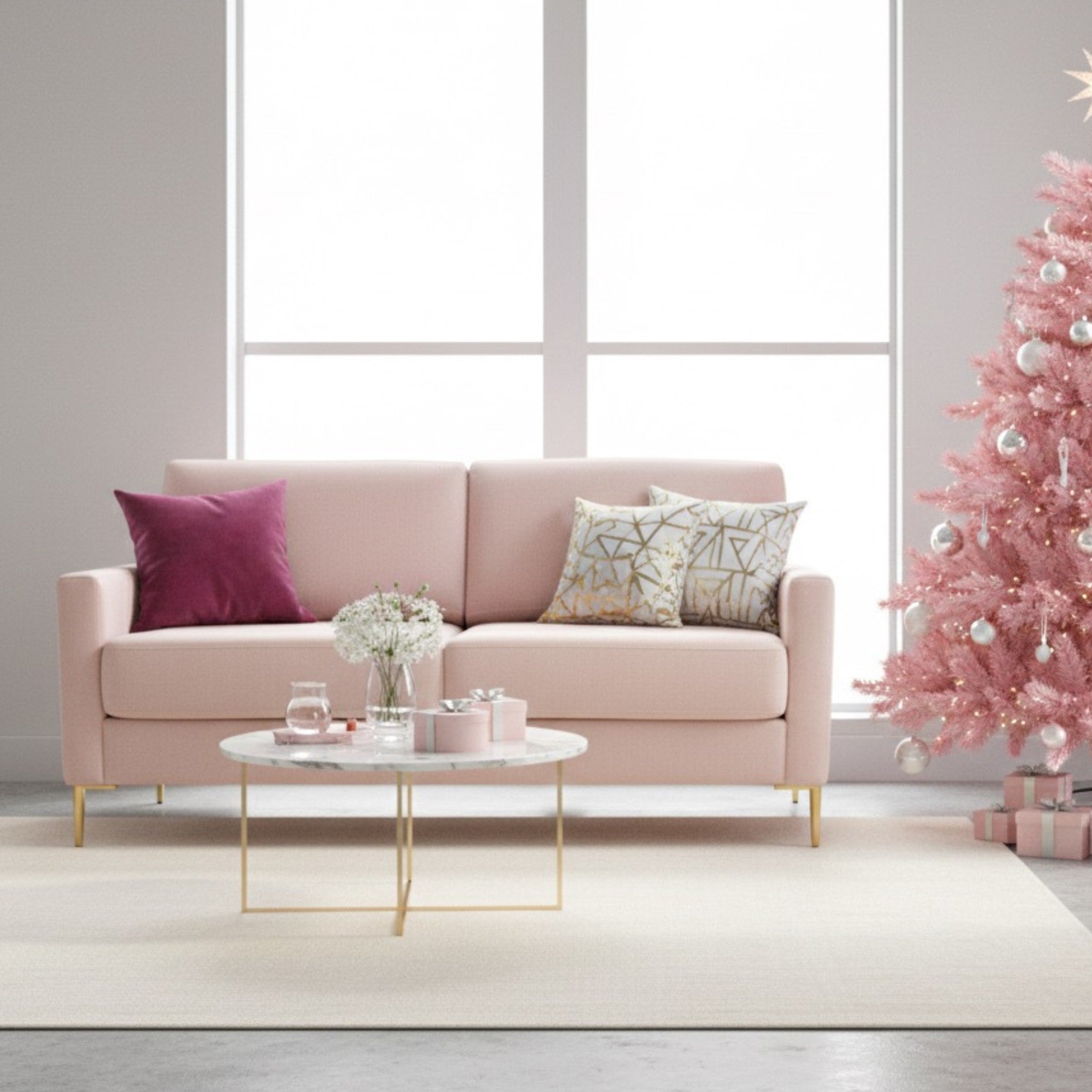 ComfortStyle Charlotte sofa in soft pink, showcasing plush fabric and modern design for cozy living room decor.
