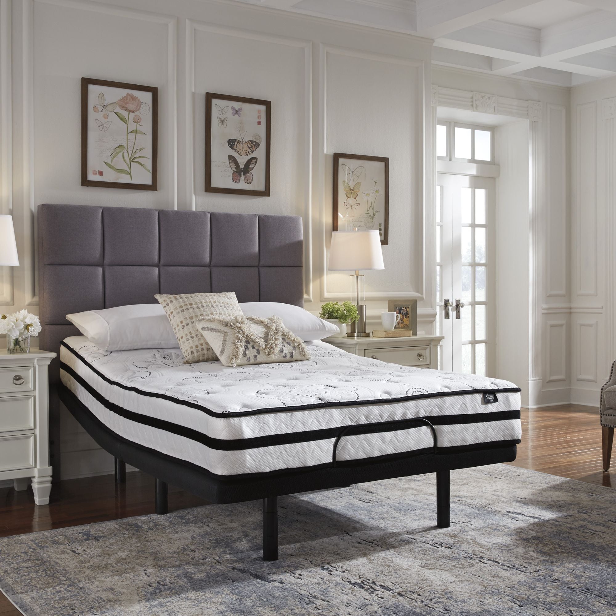 Ashley Chime 10-inch ultra plush hybrid mattress with memory foam and pocket coil construction, showing soft, luxurious surface and plush top.