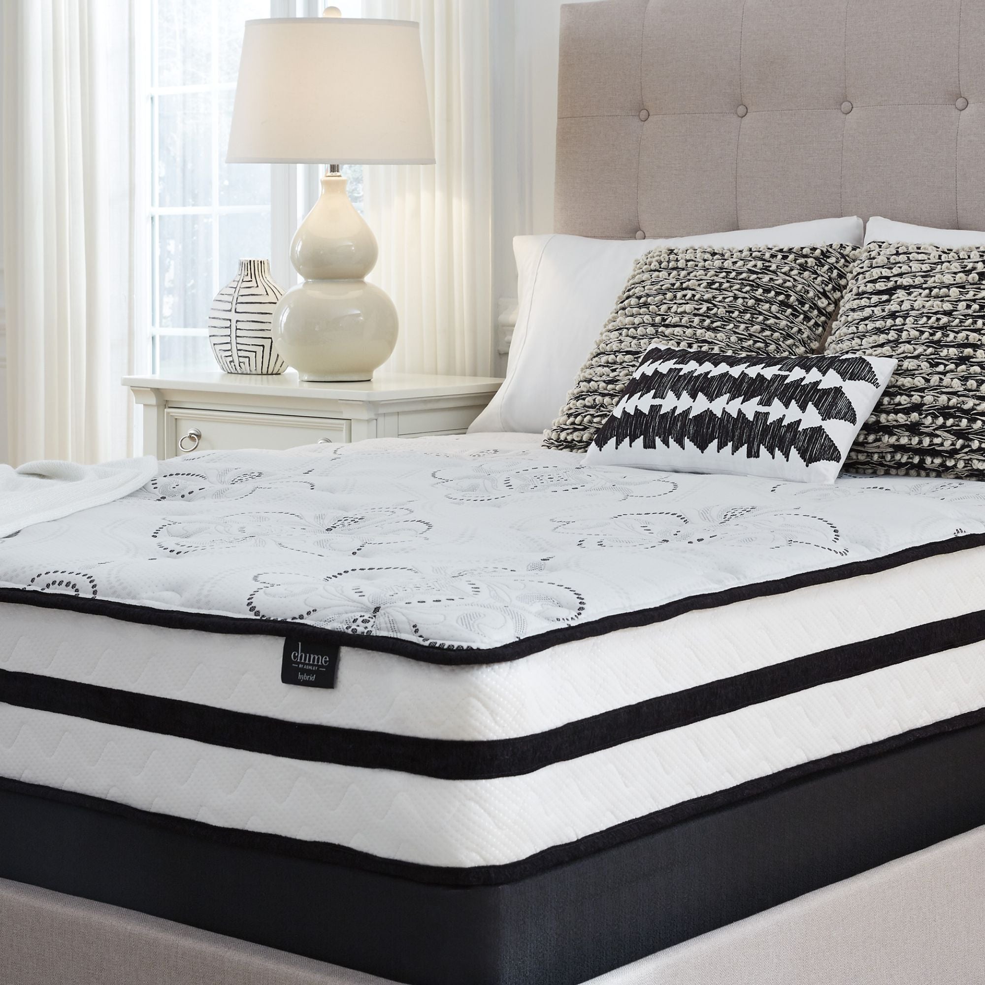 Signature Ashley Chime 10-inch ultra plush hybrid mattress showing a soft, plush surface with quilted top and supportive hybrid construction.