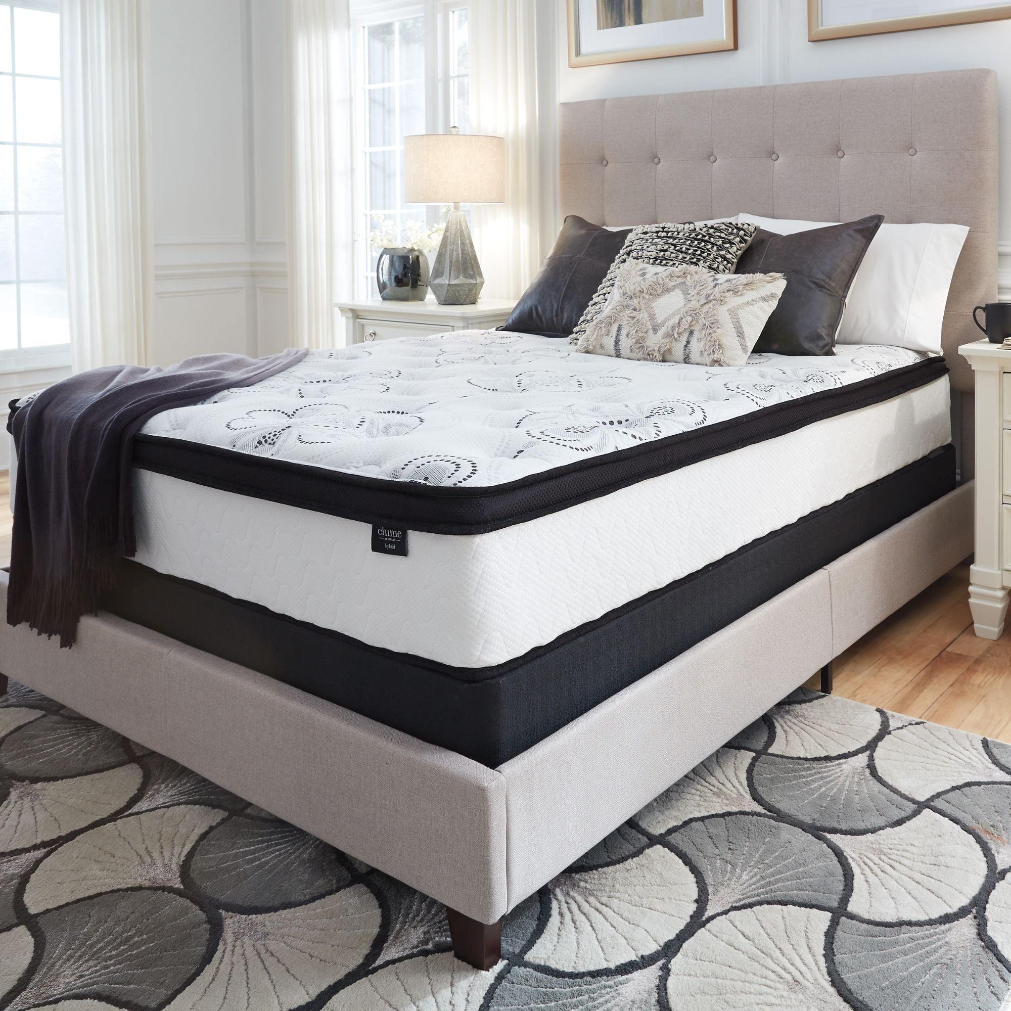 Signature Ashley Chime 12-inch ultra plush hybrid mattress showing soft, quilted surface and plush design for comfortable sleep.