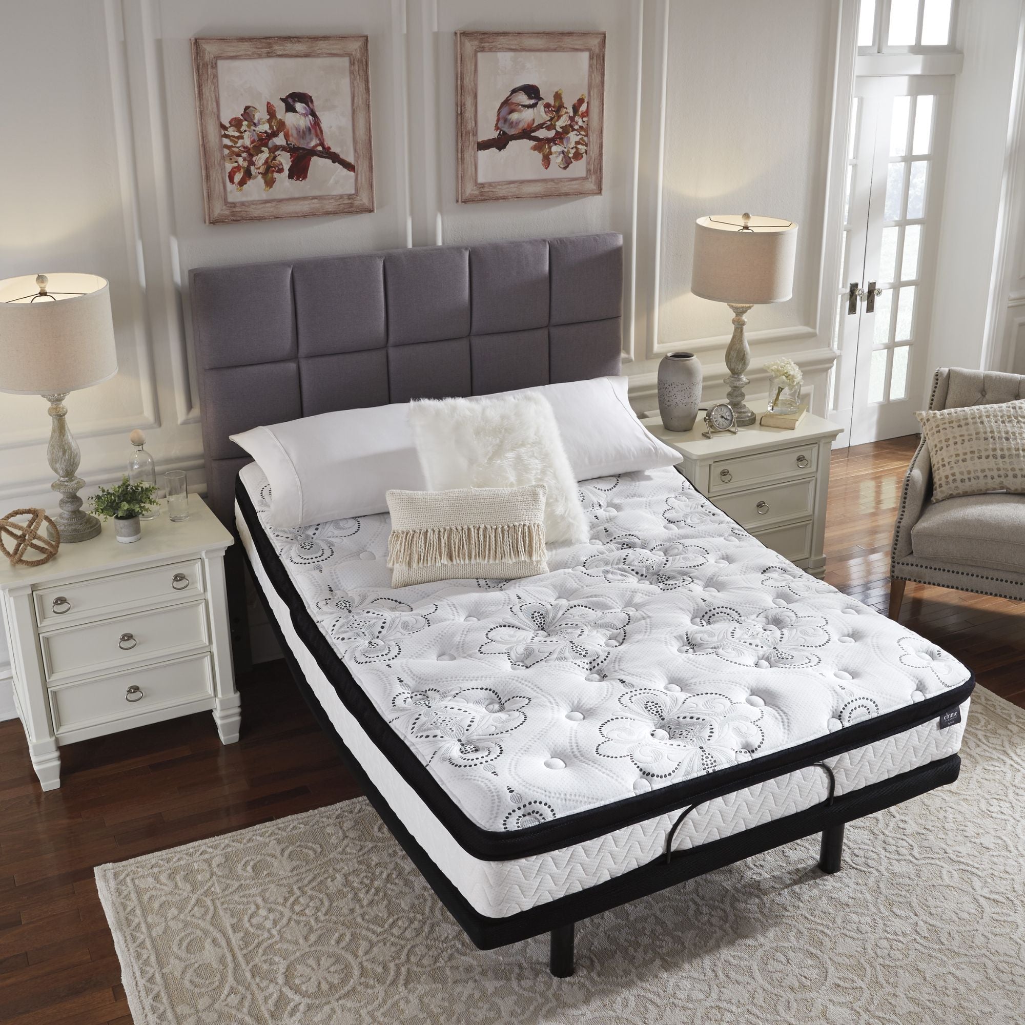 Signature Ashley Chime 12-inch ultra plush hybrid mattress with quilted top and supportive layers, designed for comfort and durability.