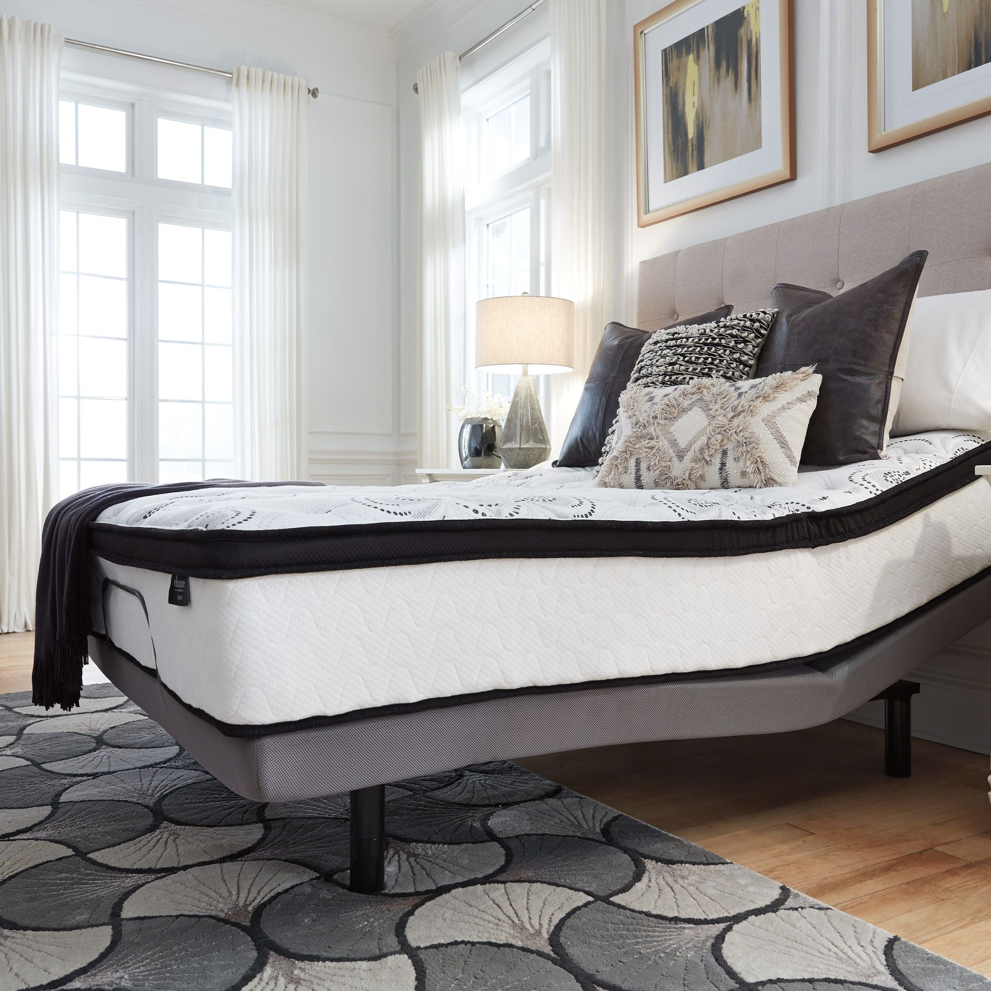 Signature Ashley Chime 12-inch ultra plush hybrid mattress with soft, comfortable surface and supportive design for restful sleep.