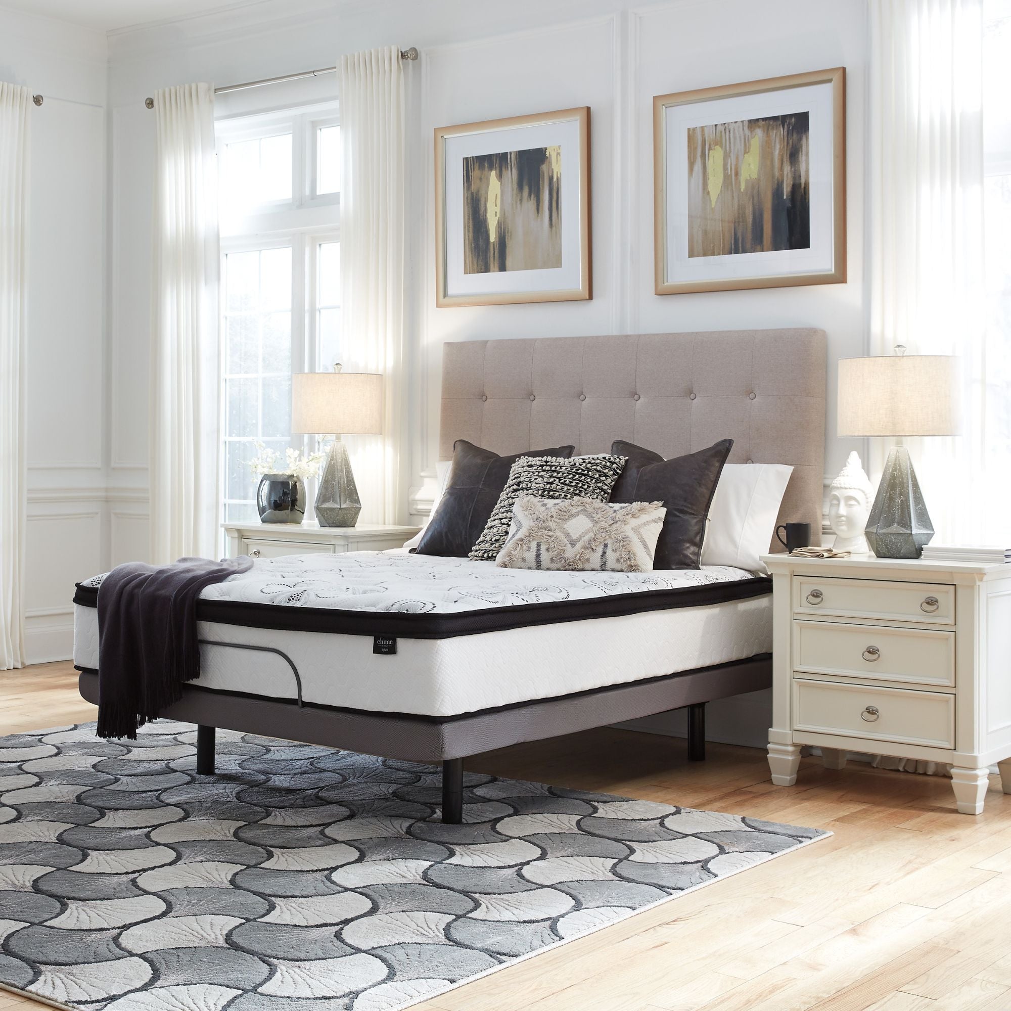 Signature Ashley Chime 12-inch ultra plush hybrid mattress with memory foam and pocketed coils, showcasing its soft, luxurious surface.