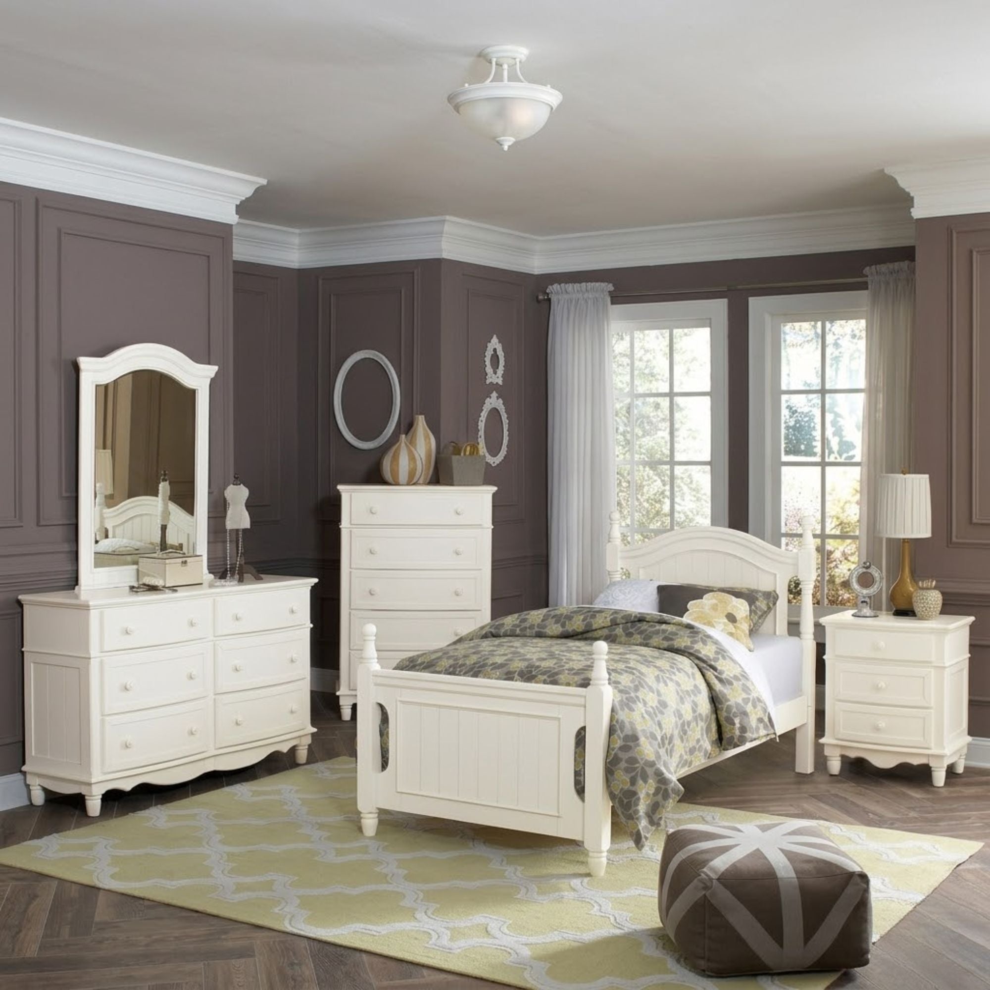 White Clementine Collection bedroom set by MAZ, featuring a bed, nightstands, and matching bedroom furniture.