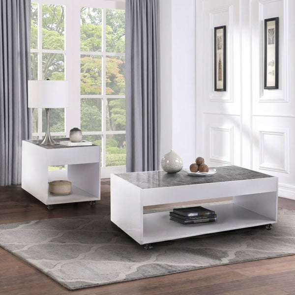 MAZ Elariel Collection white coffee table set showing three modern, sleek coffee tables with smooth surfaces and minimalist design.