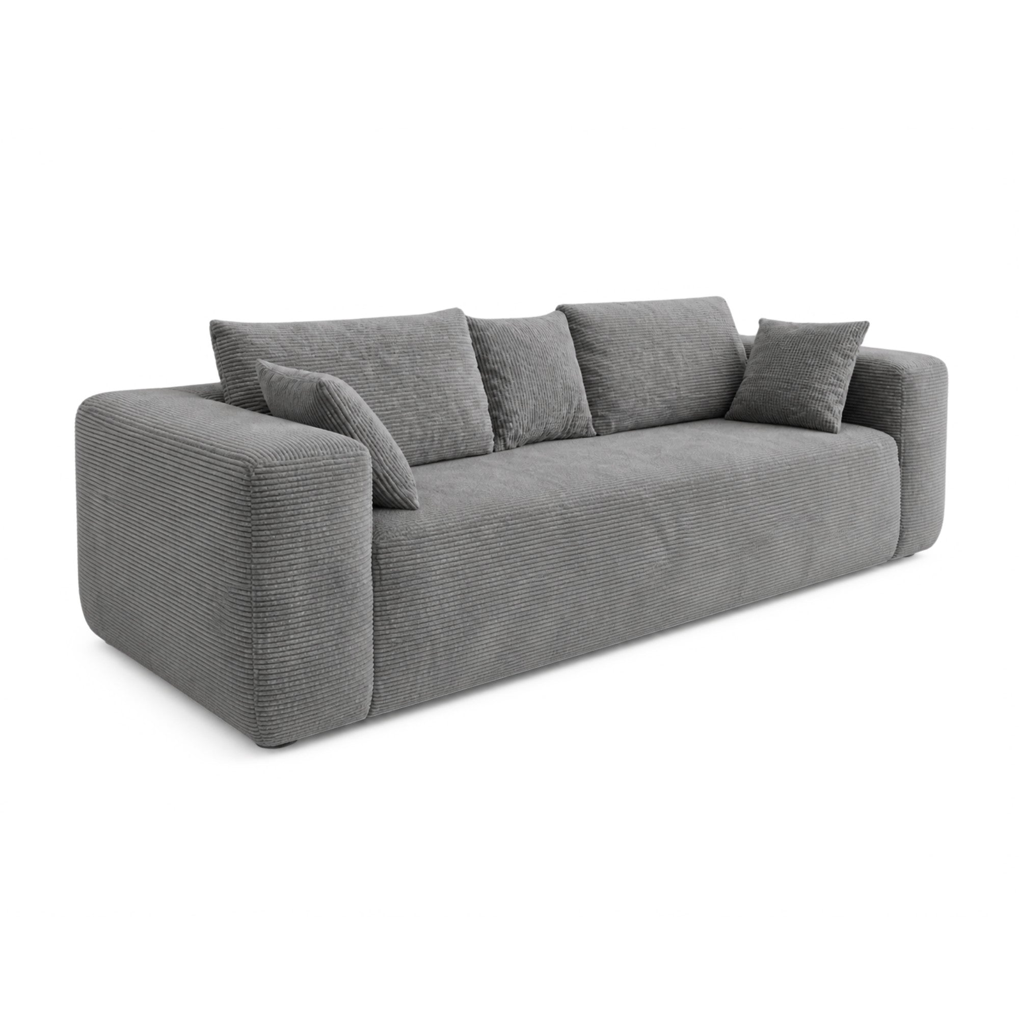 Grey low-profile compression sofa by Taste Living, showcasing sleek design and plush cushions in a modern living room setting.
