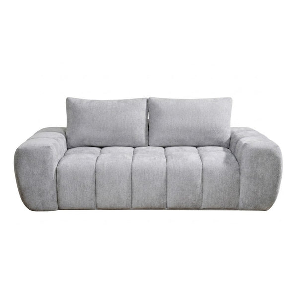 Light grey Compression CloudEase Channel Sofa by Brassex, showcasing plush cushions and modern design in a contemporary living room setting.
