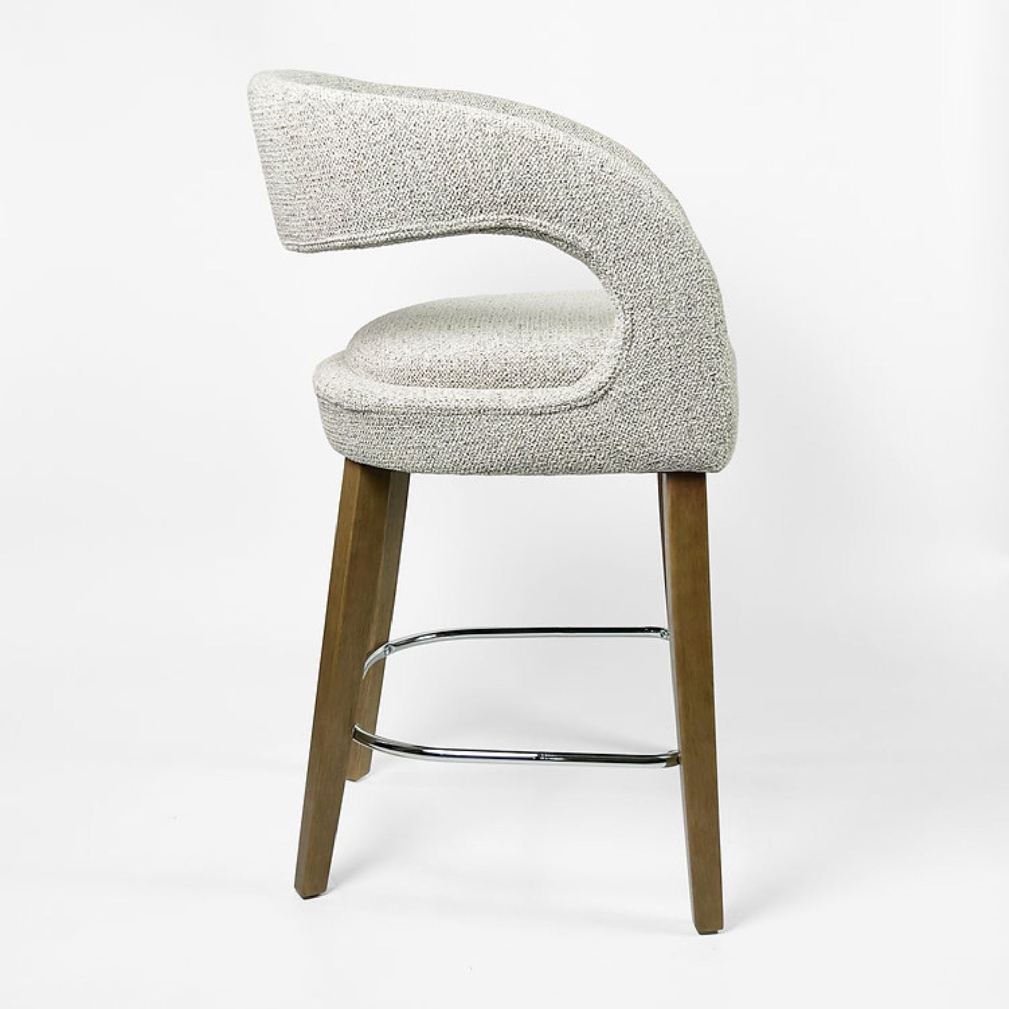 Elite Living Crestwood counter stool with wooden legs and cushioned seat, ideal for kitchen or bar area.