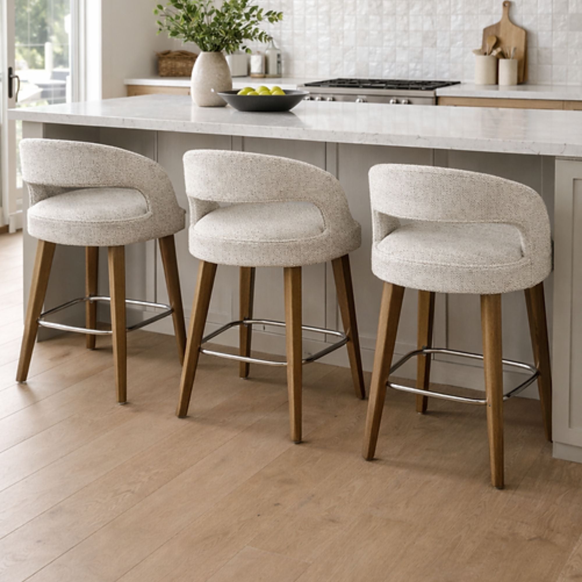 Elegant Crestwood counter stool by Elite Living with dark wooden legs and a cushioned beige fabric seat, perfect for kitchen counters.