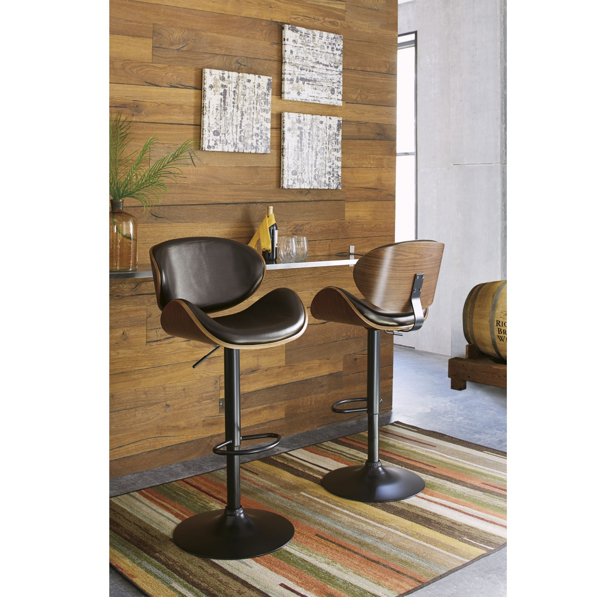 Brown Bellatier tall curved UPH swivel bar stool by Signature Ashley with a modern design and plush upholstery.