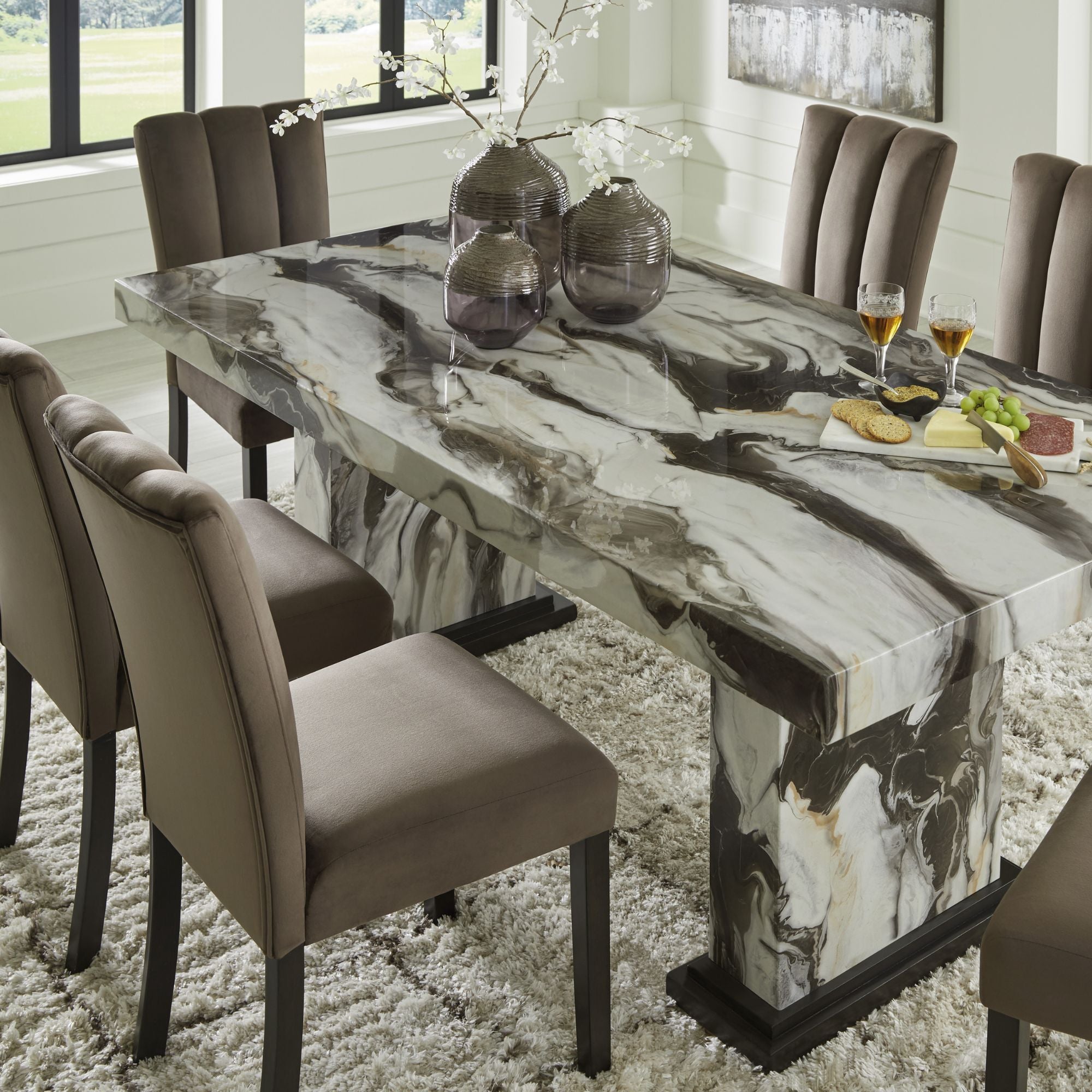 Jeshina Marble Look Dining Room Set by Signature Ashley, featuring a marble-inspired table and matching chairs in a modern dining space.