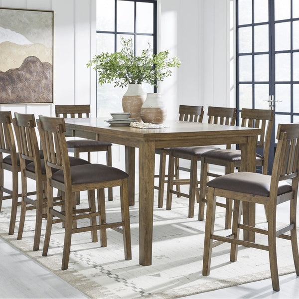 Light brown Ashley Urbinforte 9-piece counter height dining set with wood table and matching chairs, perfect for casual eating spaces.