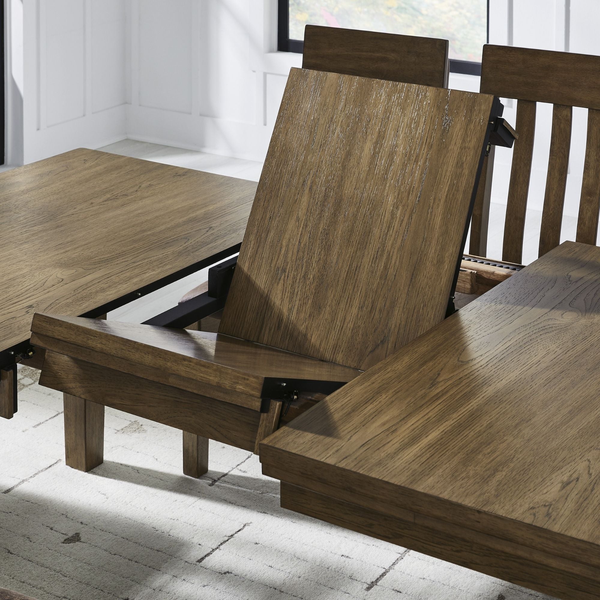 Ashley Urbinforte 6-piece dining room set with light brown finish, including table and matching chairs, in a modern dining space.