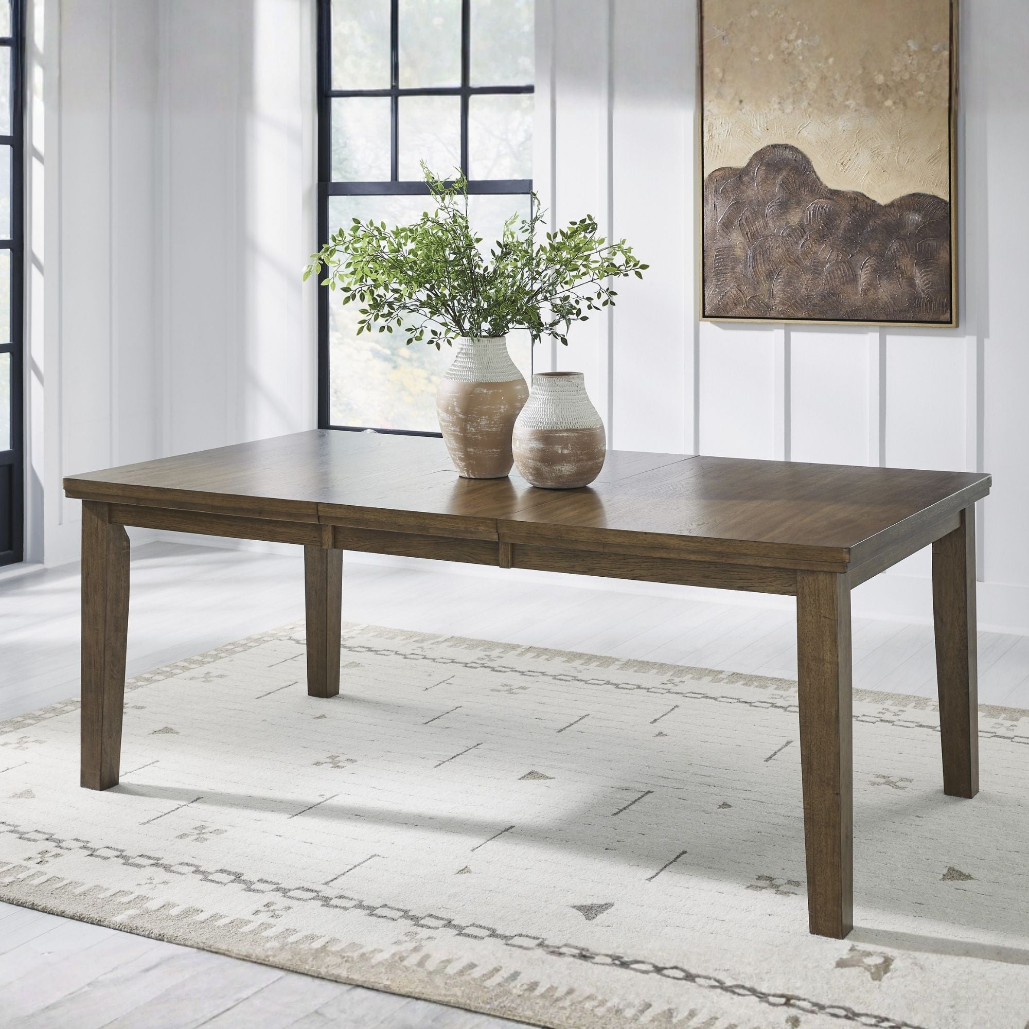 Ashley Urbinforte 6-piece light brown dining room set with table and chairs, showcasing a stylish and modern dining furniture ensemble.