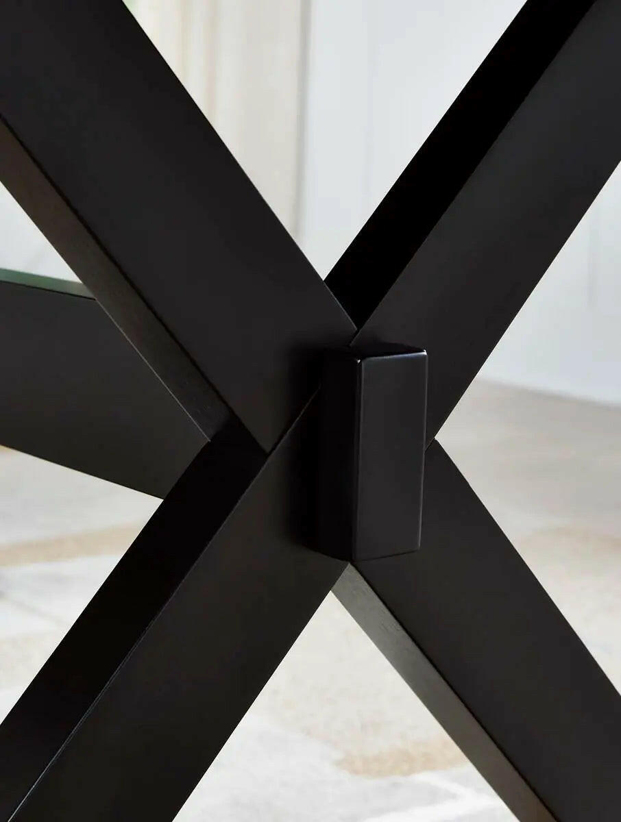 Ashley Wildenauer dining room set with table, chairs, and matching bench in a warm finish, perfect for family meals.