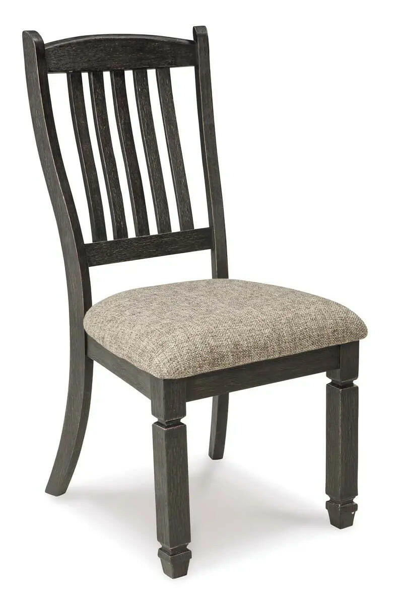 Signature Ashley Tyler Creek dining room set with two-tone finish and arm chairs, showcasing a stylish and modern dining furniture arrangement.