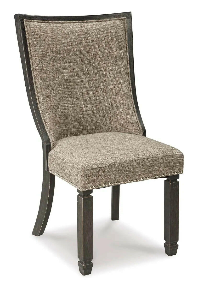 Two-tone Ashley Tyler Creek dining room set with armchairs, featuring a rectangular table and upholstered seating for a stylish dining space.