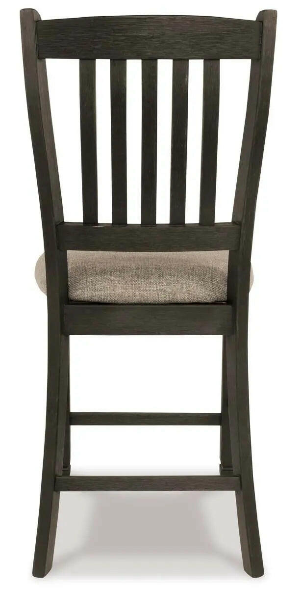 Signature Ashley Tyler Creek 6-piece counter height dining set in black and grey with upholstered chairs and a modern table design.