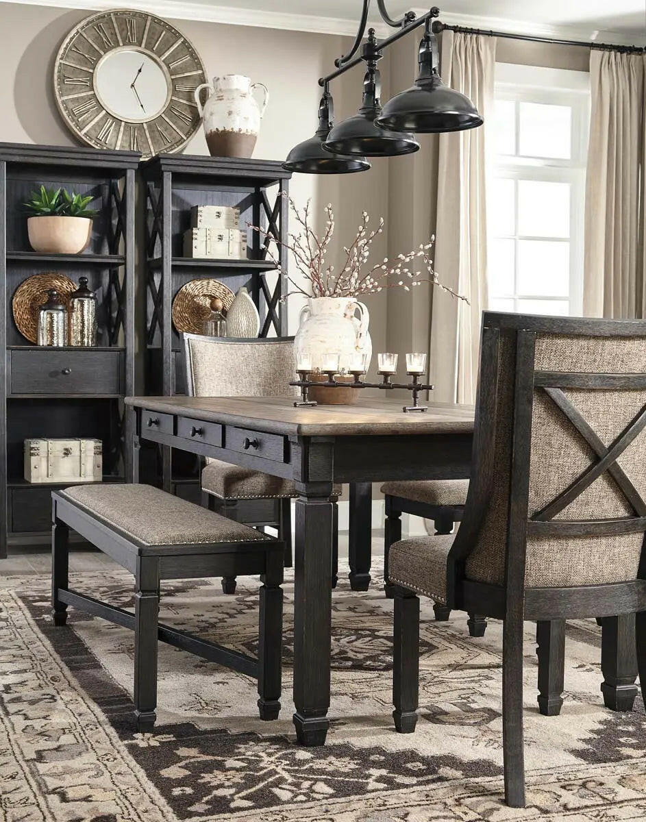 Signature Ashley Tyler Creek two-tone dining room set with arm chairs, featuring a stylish table and matching upholstered chairs.