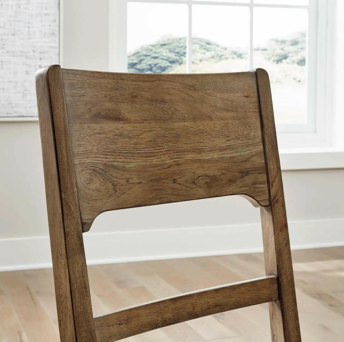 Cabalynn 6-piece brown dining set with wooden table and matching chairs, by Signature Design Ashley, shown from back detail view.