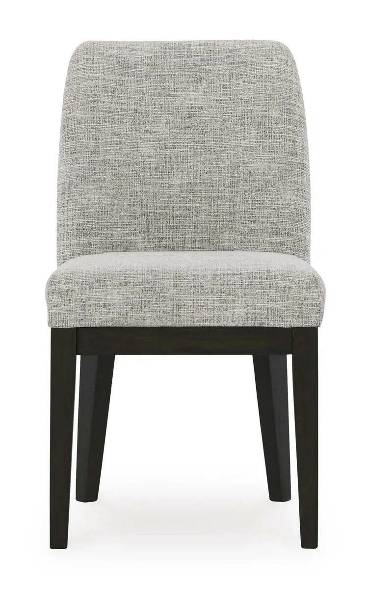 Dark brown Ashley Signature dining room set with arm chair and table, shown from a head-on angle.