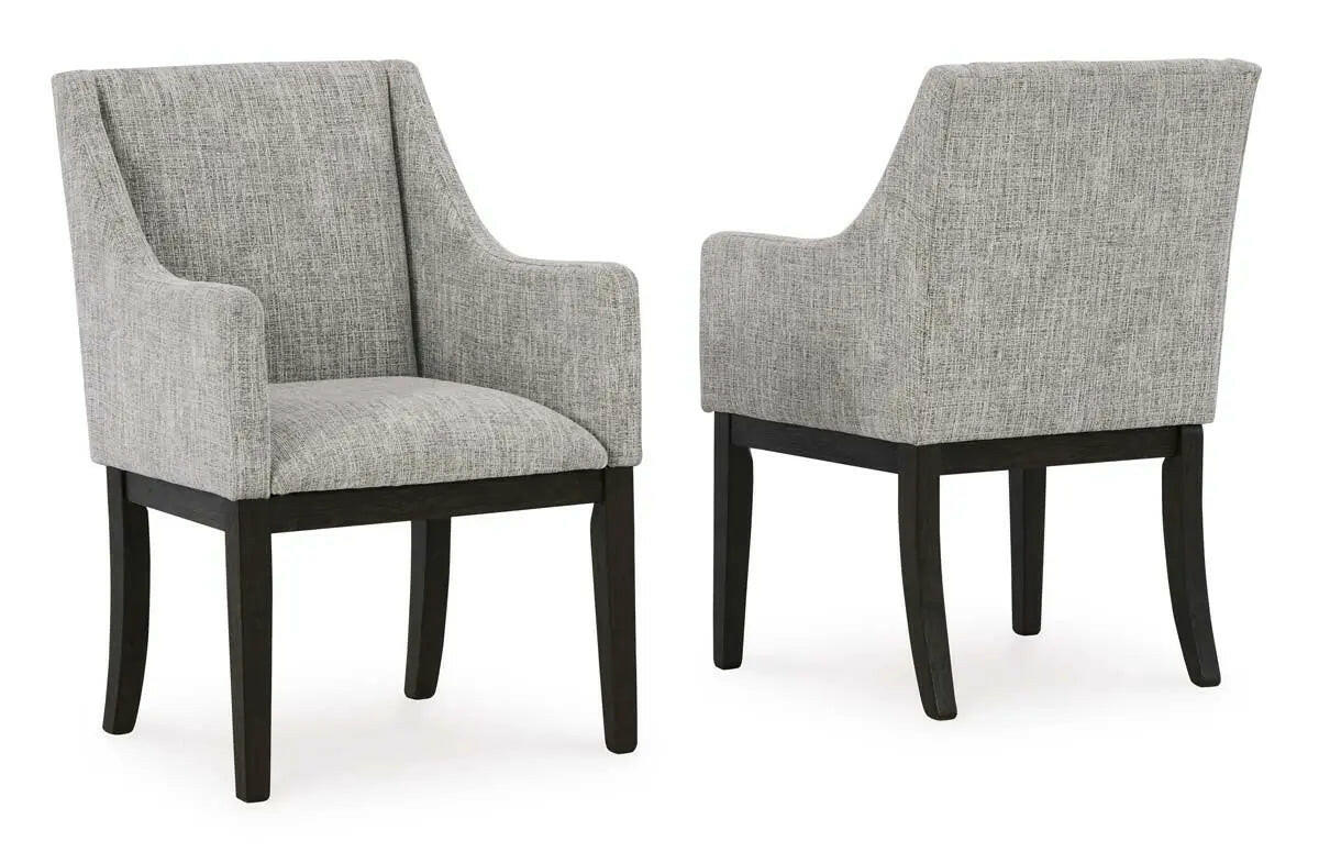 Dark brown Ashley Signature dining room set with armchair and table, modern design, featuring a sturdy wood construction.