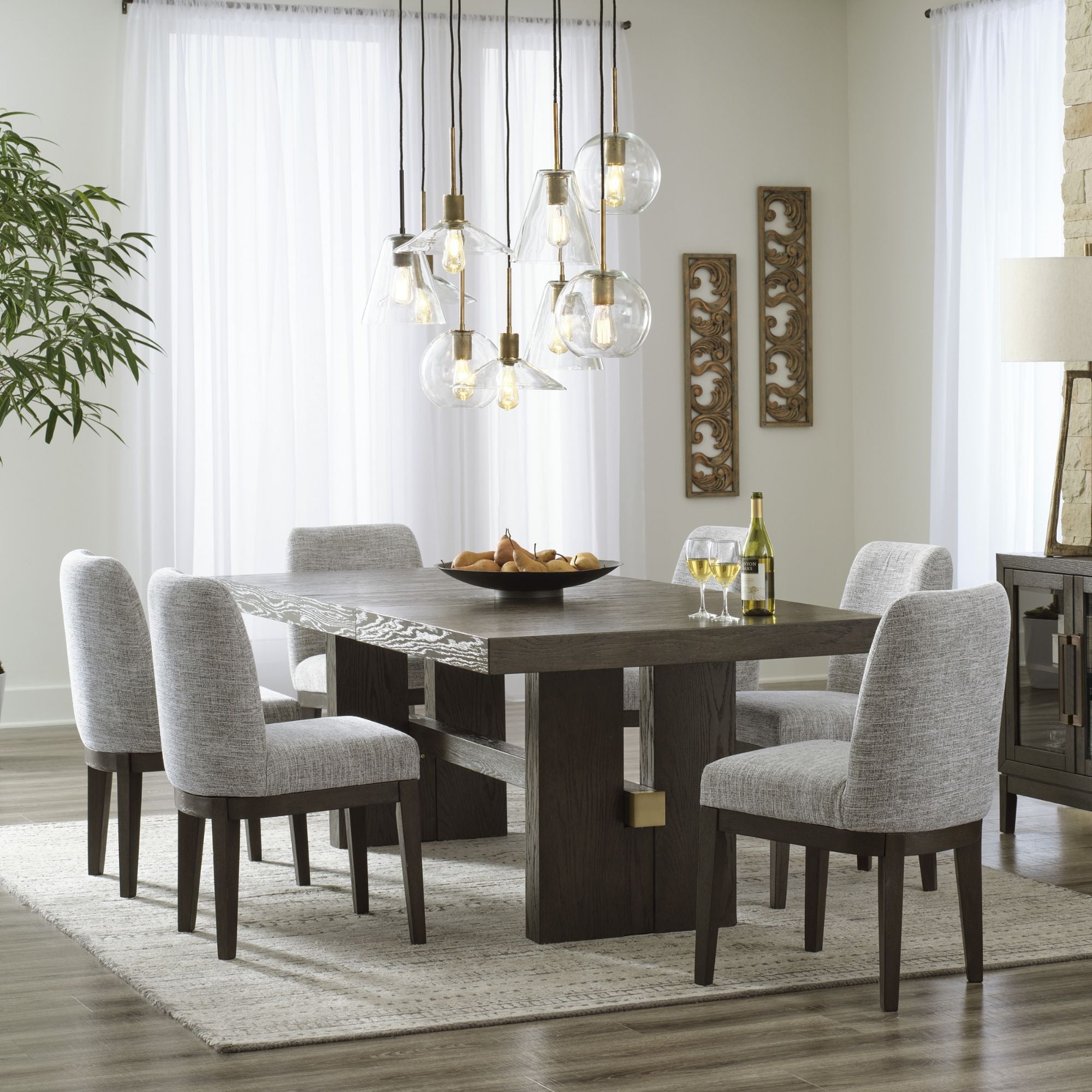 Dark brown Ashley Signature dining room set with a table and chairs, featuring a classic design for elegant dining spaces.