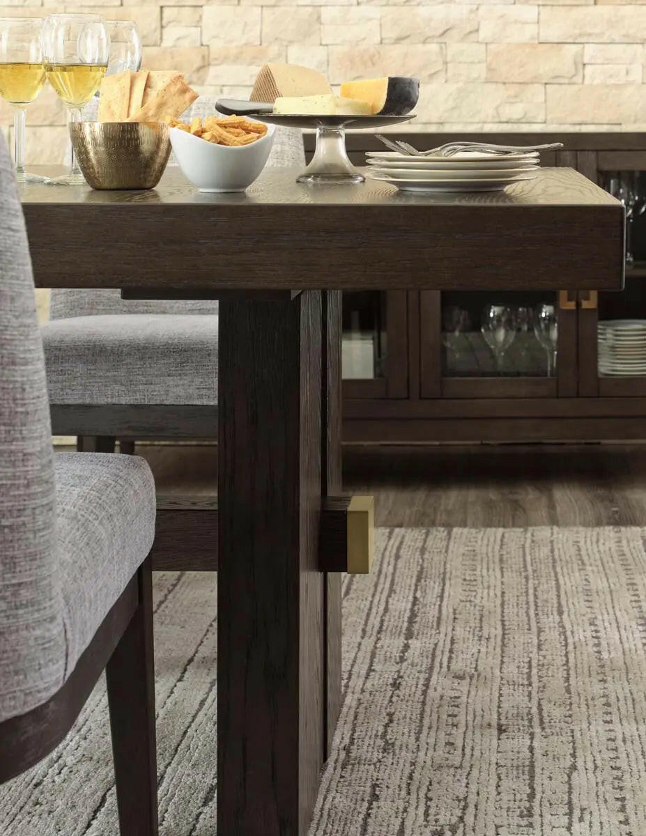 Dark brown Ashley Burkhaus EXT dining room set with arm chair, showcasing the elegant wood finish and comfortable upholstered seat.