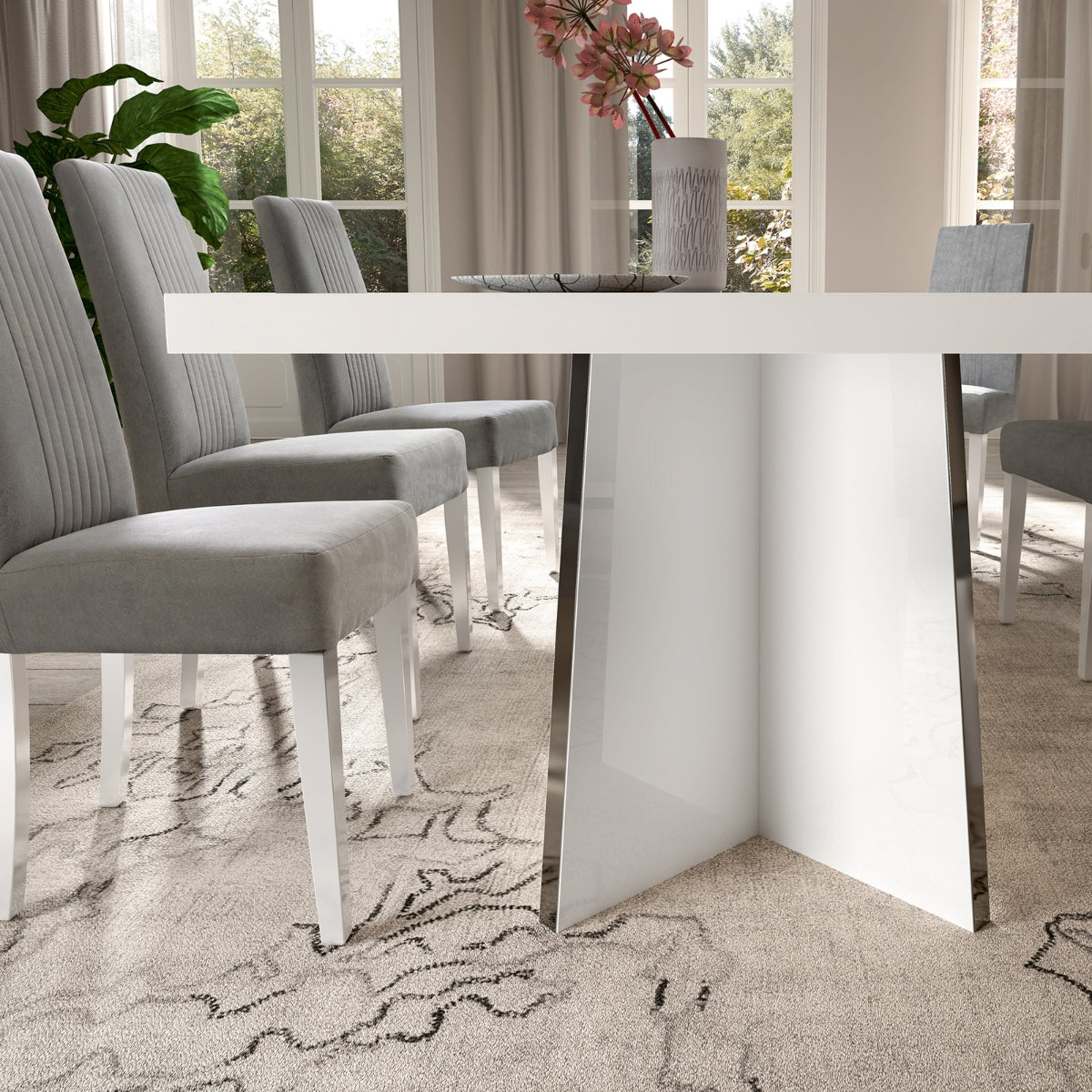 Detail of the Mara 7-piece white Italian lacquer dining room set by Status Italia, showcasing the elegant dining table and chairs.