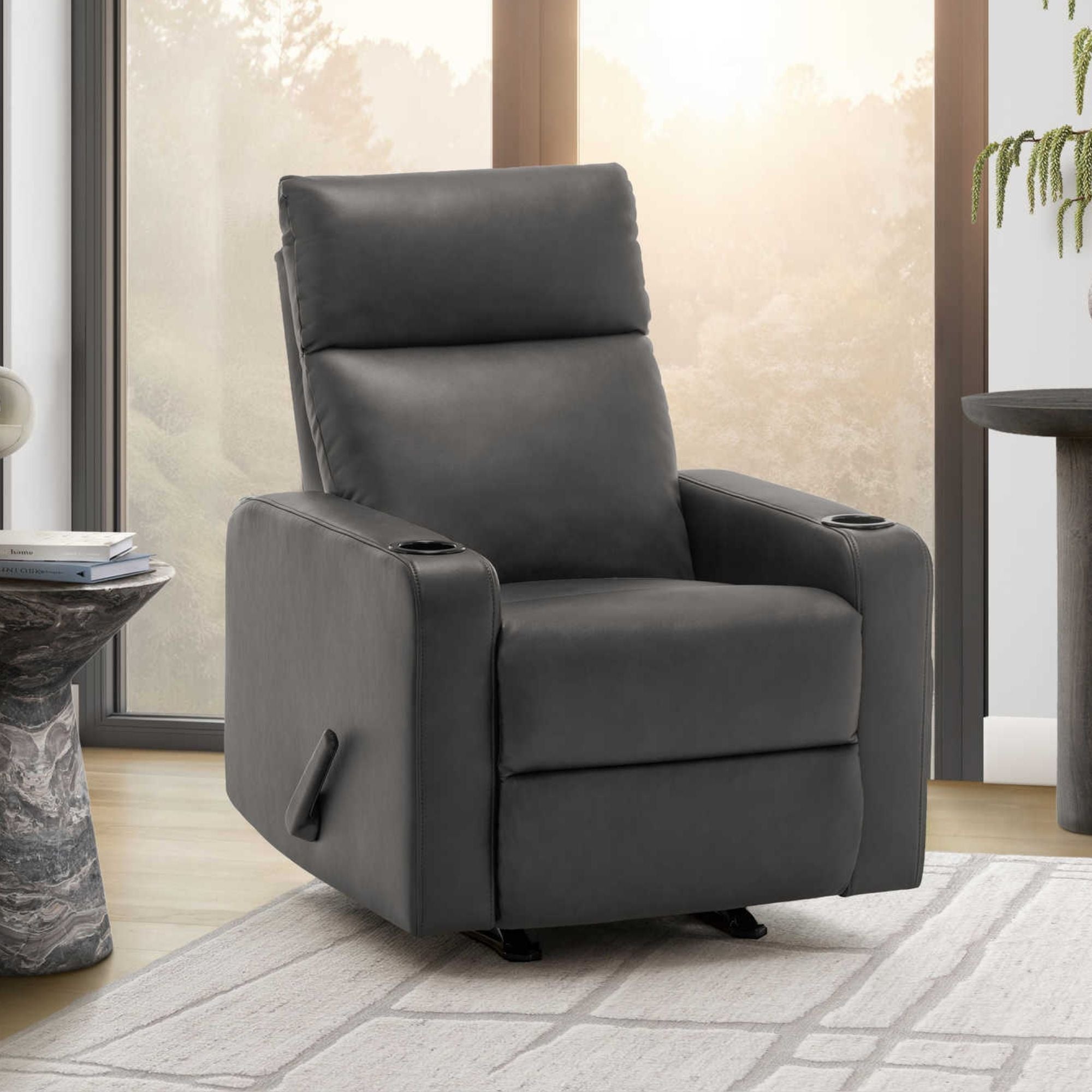 Dark grey Arden rocker reclining chair with built-in cupholders by Monarch Specialties, showcasing plush upholstery and armrests.